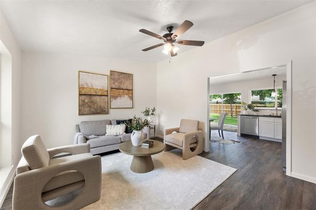 Bright living room with fresh, modern finishes. | Image 5