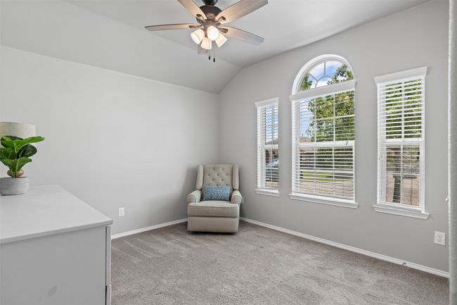 Secondary bedroom located near front entry of the home. | Image 5