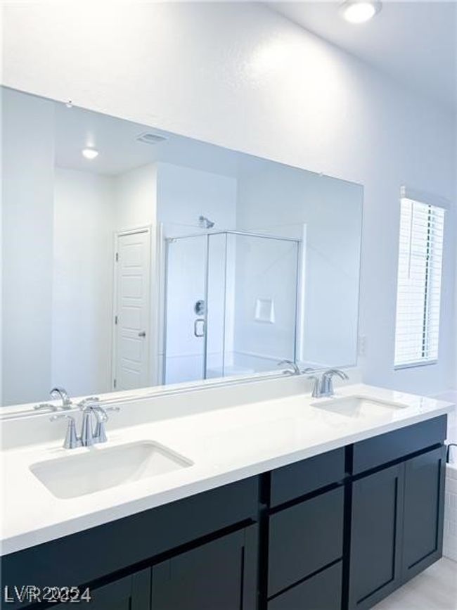 Full bathroom featuring recessed lighting, double vanity, and separate Tub and shower | Image 13