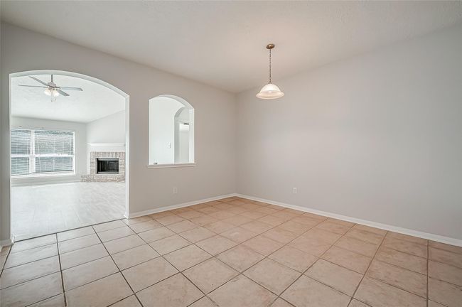 Formal dining area overlooking the living room | Image 4