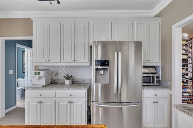 225 Ruby Forest Pkwy, House other with 4 bedrooms, 3 bathrooms and 5 parking in Suwanee GA | Image 14
