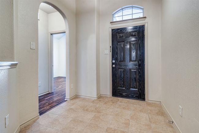 Foyer featuring arched walkways | Image 5