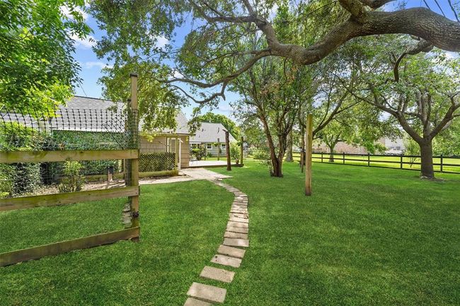 Charming backyard chicken coop included—perfect for farm-fresh eggs and a touch of country living right at home. | Image 24