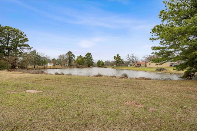 View of yard with a water view | Image 22