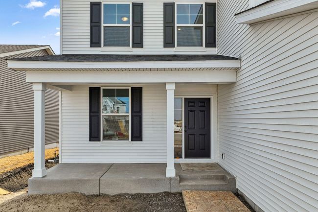 Check out the large front porch! | Image 7