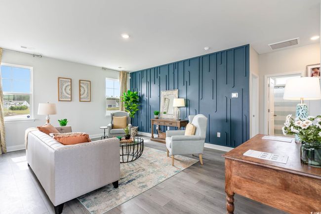 Living room with light wood-type flooring and recessed lighting | Image 9