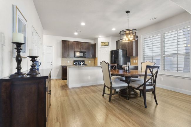 beautiful light floors in this easy living condo | Image 7
