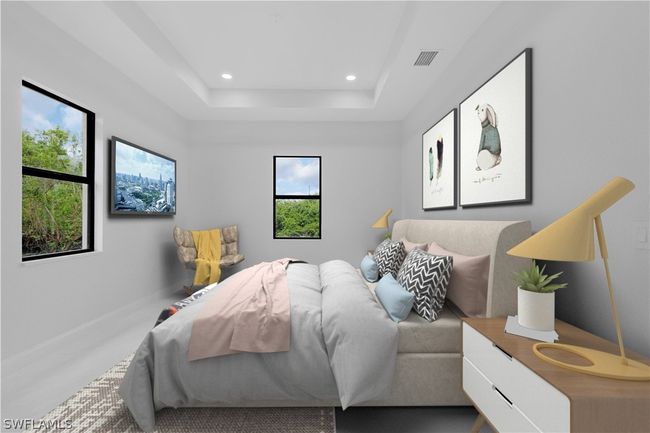 Bedroom with a tray ceiling | Image 5