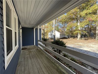 Deck featuring covered porch | Image 3