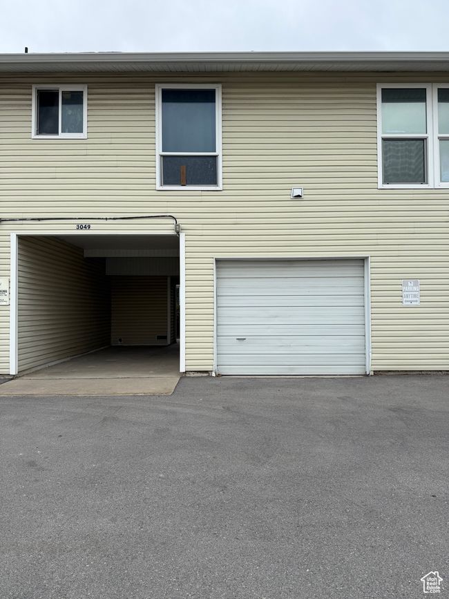 Garage featuring aphalt driveway | Image 21