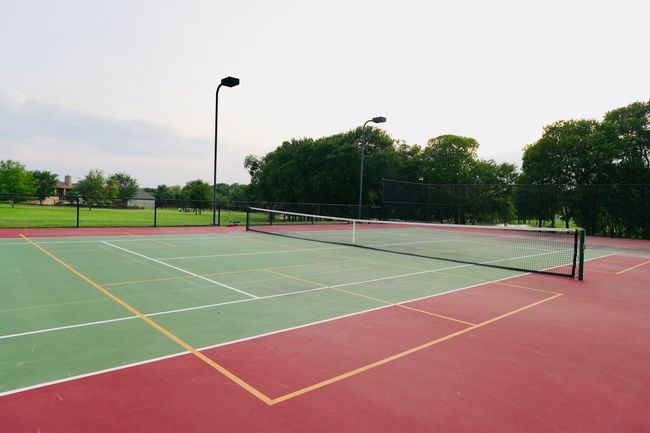 View of tennis court with community basketball court | Image 34
