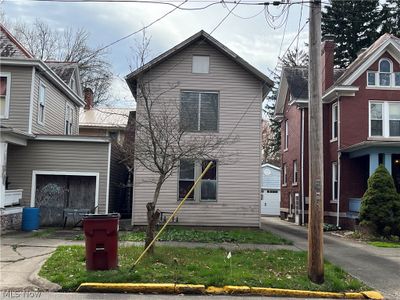 View of front of house with a garage | Image 2