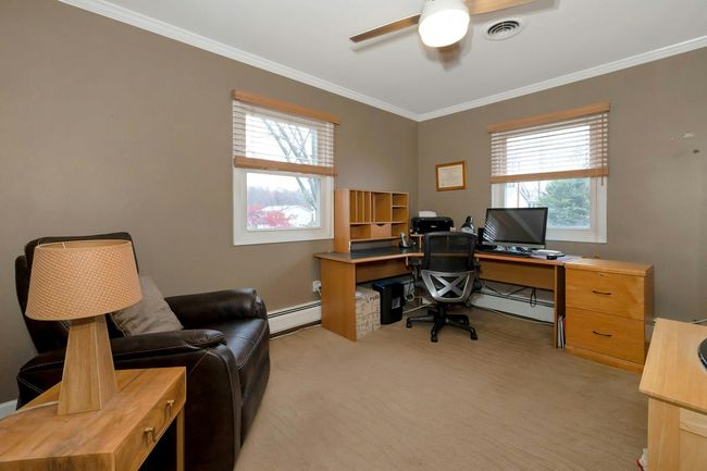 Bedroom 3 currently being used as an office | Image 19