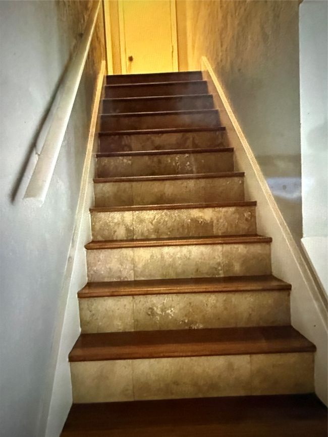 Staircase featuring wood finished floors Leading to upstairs bedroom | Image 21