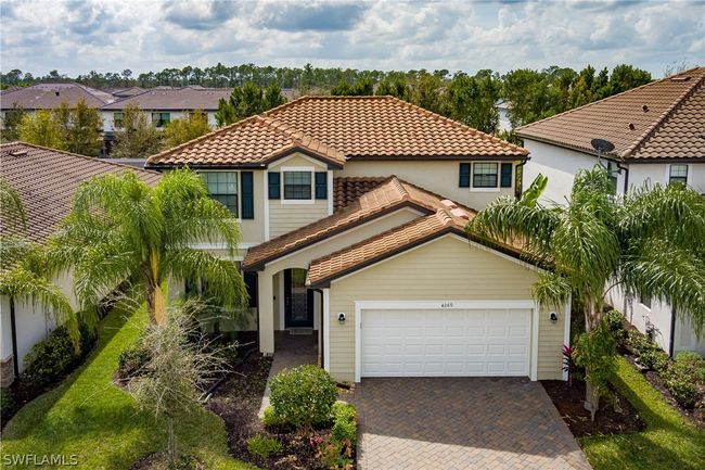 Mediterranean / spanish-style house featuring a garage | Image 36