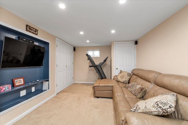 Living room with baseboards, carpet floors, and recessed lighting | Image 12