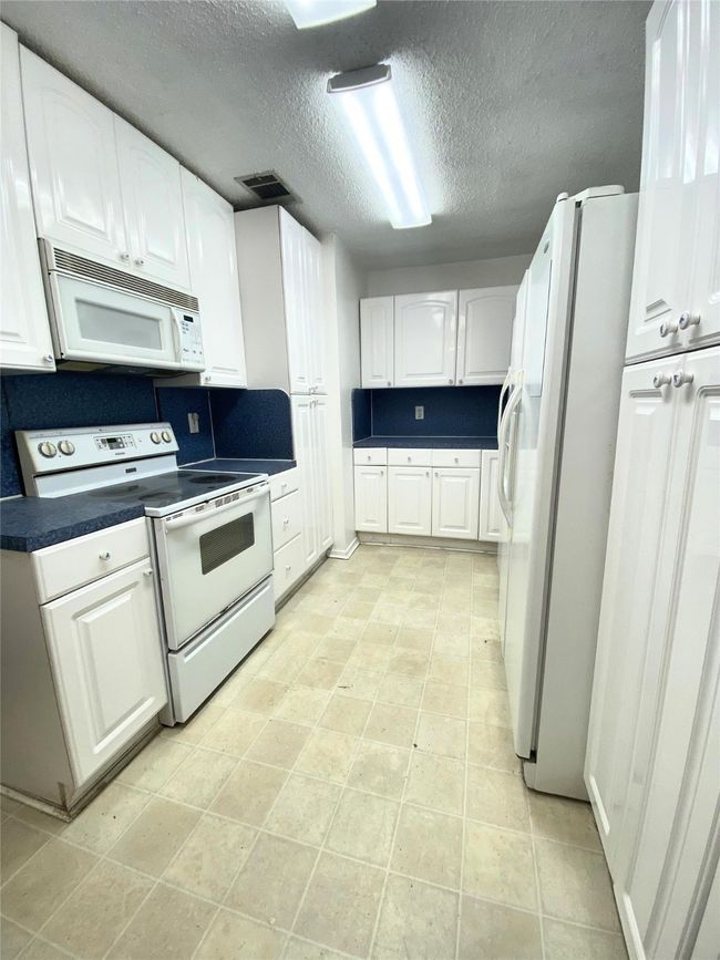 KITHCEN WITH TWO PANTRY CABS & EXTRA FREEZER | Image 5