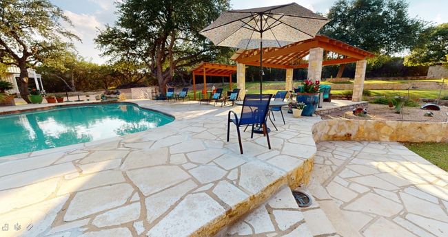 View of swimming pool featuring a patio area and gazebo. Terraced lawns and patios. Soak up the sun or relax in the shade. | Image 21