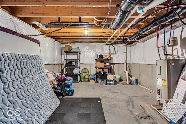Larger storage room in the basement (1 of 2 storage rooms) shared with the newer mechanicals | Image 33