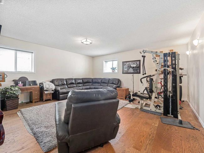 1407 Thorburn Drive Se, Home with 4 bedrooms, 3 bathrooms and 4 parking in Airdrie AB | Image 24