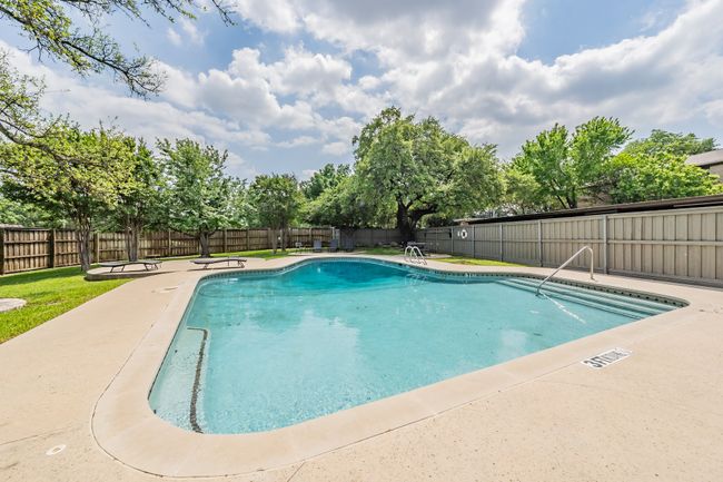 Pool featuring a fenced backyard | Image 24