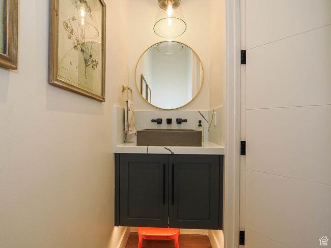 Bathroom with vanity and wood finished floors | Image 63