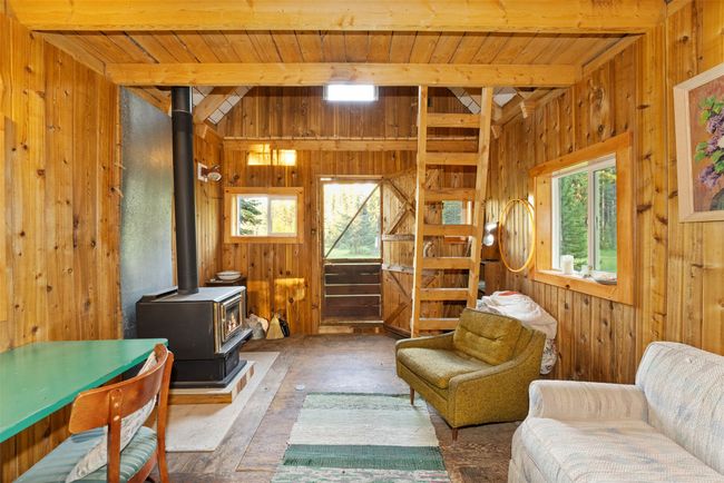 Wood burning stove in the guest cabin. | Image 33