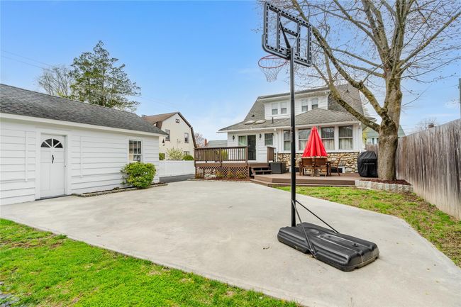 View of sport court featuring a fenced backyard | Image 36
