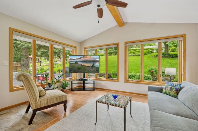 This relaxing light-filled room is the perfect place to relax & enjoy the backyard | Image 7