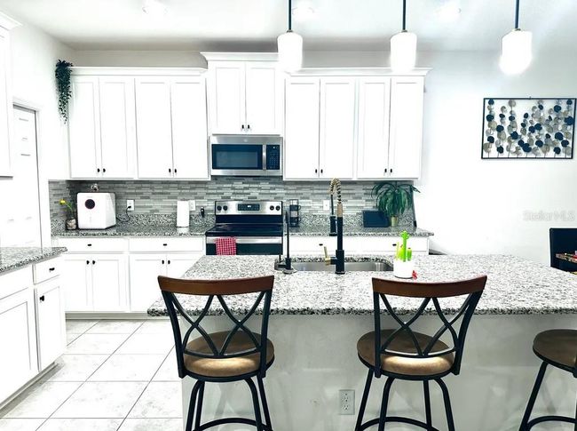 37784 Beacon Brick Dr, House other with 4 bedrooms, 3 bathrooms and null parking in ZEPHYRHILLS FL | Image 6