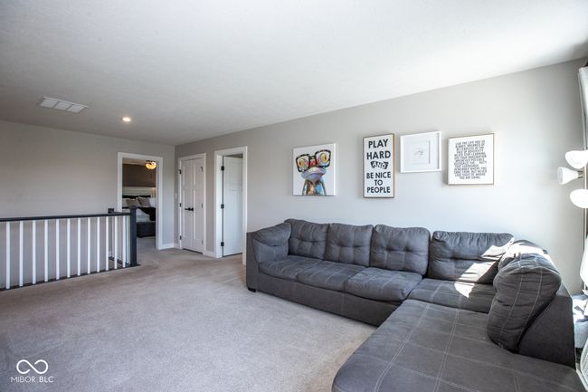 living room featuring carpet flooring and recessed lighting | Image 20