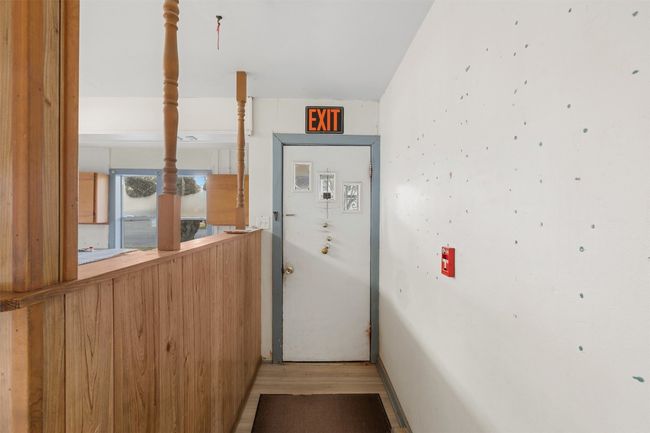 Doorway featuring light wood finished floors | Image 10
