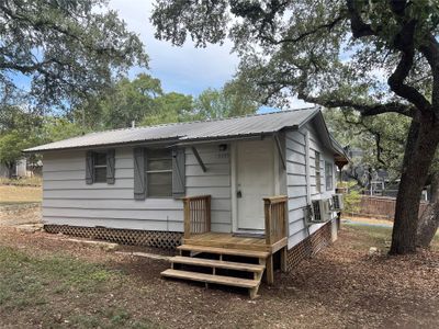 front of cabin | Image 1