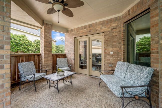 Enjoy a private moment out on the patio, ideal protected space for morning coffee while catching up on your emails. | Image 34
