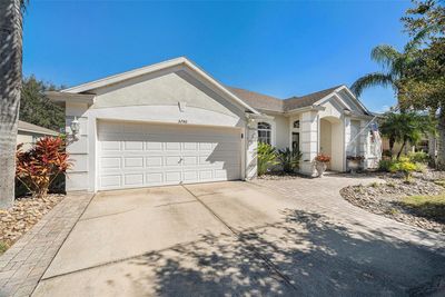 5740 Riva Ridge Drive, House other with 4 bedrooms, 3 bathrooms and null parking in Wesley Chapel FL | Image 2