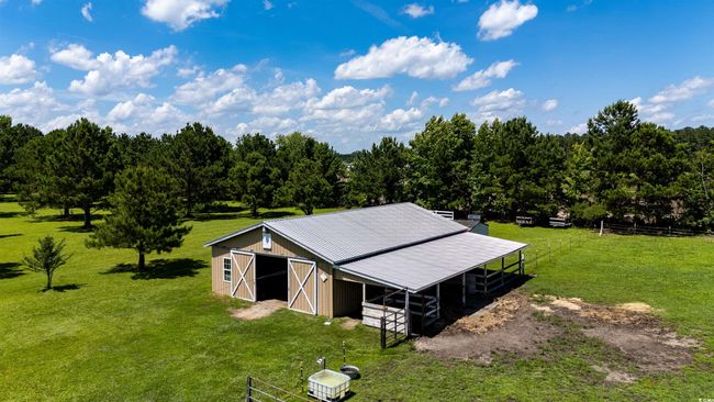 View of outbuilding with an exterior structure | Image 9