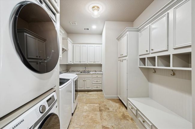 Brand New Washers And Dryers Stay With The Home. Custom Cabinetry With Tons of Storage And New Mud Room Addition | Image 35