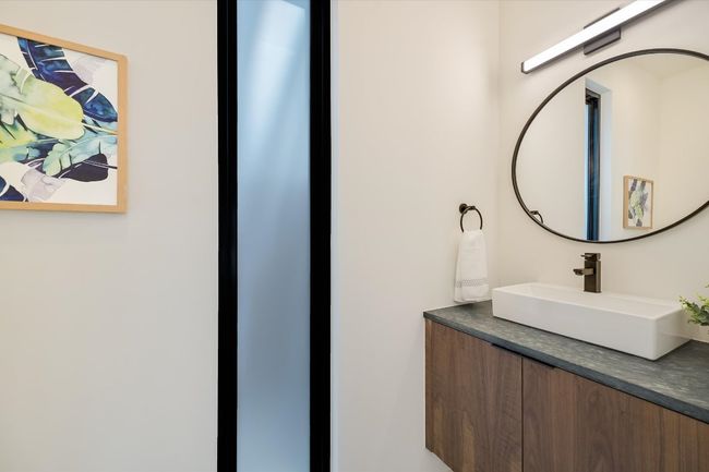 Bathroom featuring vanity | Image 16