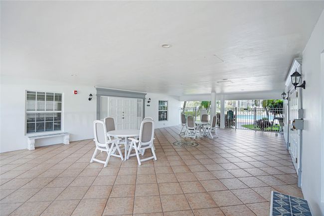 JUST LISTED, A BEACH & BOATERS LOVERS DREAM!!.. PRIVATE DEEDED BEACH ACCESS ACROSS THE STREET AND NEW BOAT DOCK TO LIVE THE LIFESYTLE OF LAUDERDALE BY THE SEA. THIS HIGHLY DEMANDED 2 BEDROOM 2 BATH UNIT FEATURES THE PERFECT LOCATION IN A WELL MANAGED AND FINANCIALLY SOUND COMPLEX WITH ALL CERTIFICATIONS COMPLETED. THE UNIT OFFERS ALOT OF UPDATES, HIGH IMPACT DOORS, WINDOWS, NEWER AC AND HOT WATER HEATER AS WELL AS A NICE SUNROOM OFFERING PLUSH BOTANICAL GARDEN & POOL VIEWS. | Image 18