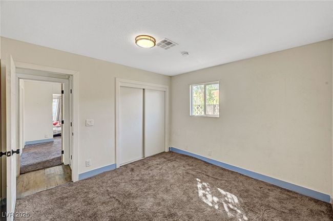 Unfurnished bedroom featuring carpet floors and a closet | Image 21