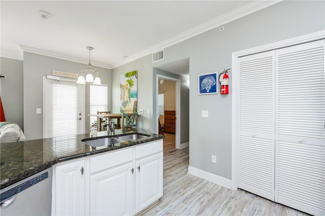 Kitchen right off of the living and dining areas. | Image 13