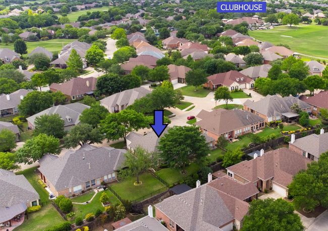 Aerial view of residential area featuring a local golf course | Image 6