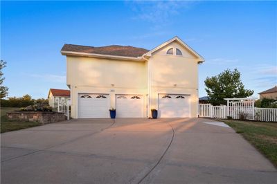 3-car side entry garage with lots of extra parking | Image 3