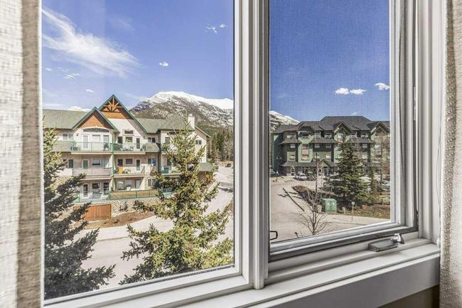 306 - 173 Kananaskis Way, Home with 2 bedrooms, 2 bathrooms and 1 parking in Canmore AB | Image 33