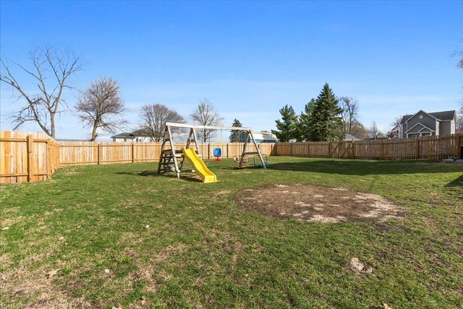 Completely enclosed privacy fence with treated woo | Image 36