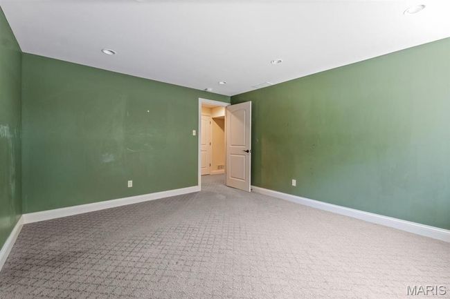 Carpeted spare room featuring baseboards and recessed lighting | Image 53