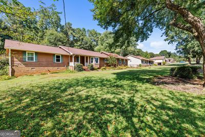 80 Country Roads Drive, House other with 3 bedrooms, 2 bathrooms and 2 parking in Stockbridge GA | Image 1