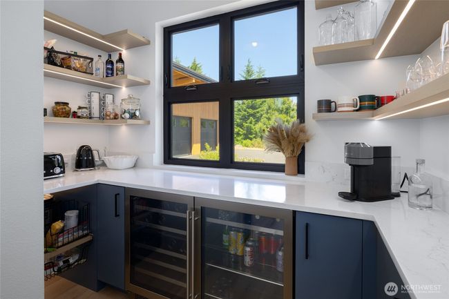 Awesome pantry off the kitchen w/wine & beverage fridge. | Image 10