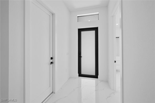 928 Ne 8 Th Pl, Condo with 6 bedrooms, 4 bathrooms and null parking in Cape Coral FL | Image 4