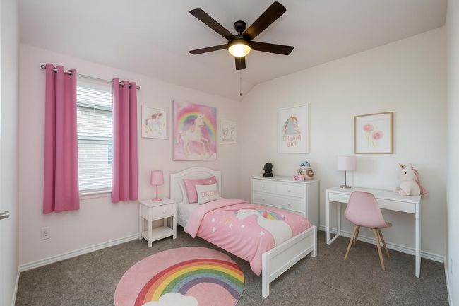 Bedroom featuring carpet flooring, a ceiling fan, and vaulted ceiling | Image 22